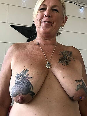petite old mature column with tattoos